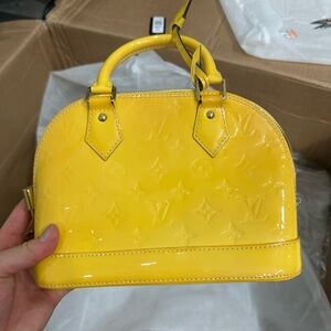 Louis Vuitton Alma bb leather Yellow Handbag